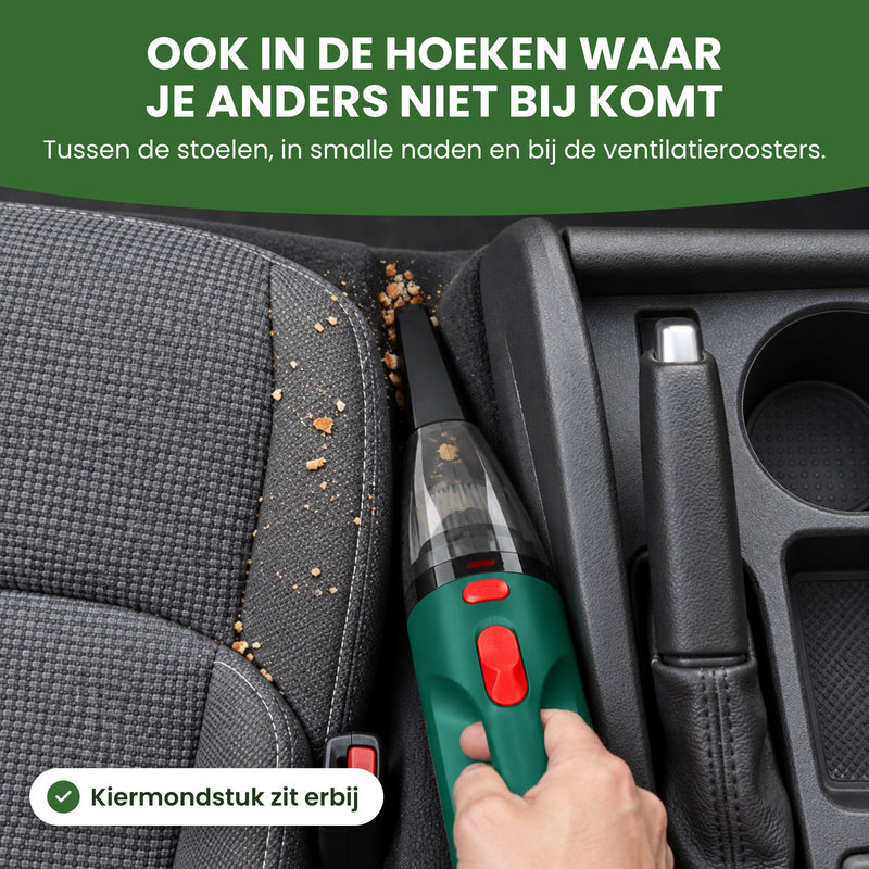 Groene Dustero met het kiermondstuk zuigt kruimels uit de naad tussen autostoel en middenconsole: ook in de hoeken waar je anders niet bij komt