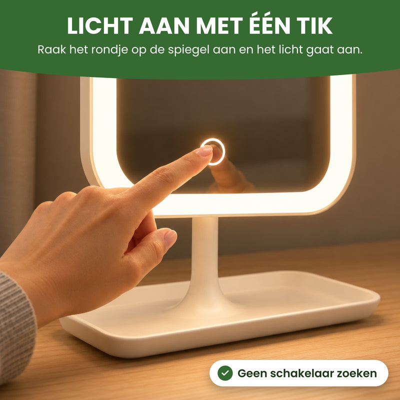 Vinger raakt het ronde knopje onderaan op de Glamova aan en het licht rondom de spiegel gaat aan: licht aan met één tik