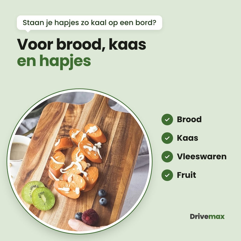De Langova snijplank in de hand met hapjes, kiwi en bessen erop: voor brood, kaas, vleeswaren en fruit
