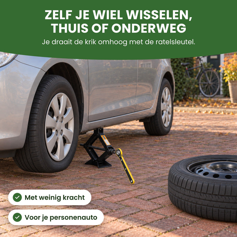 LiftMax autokrik onder de dorpel van een personenauto op een oprit, met de ratelsleutel eraan en een reservewiel ernaast: zelf je wiel wisselen
