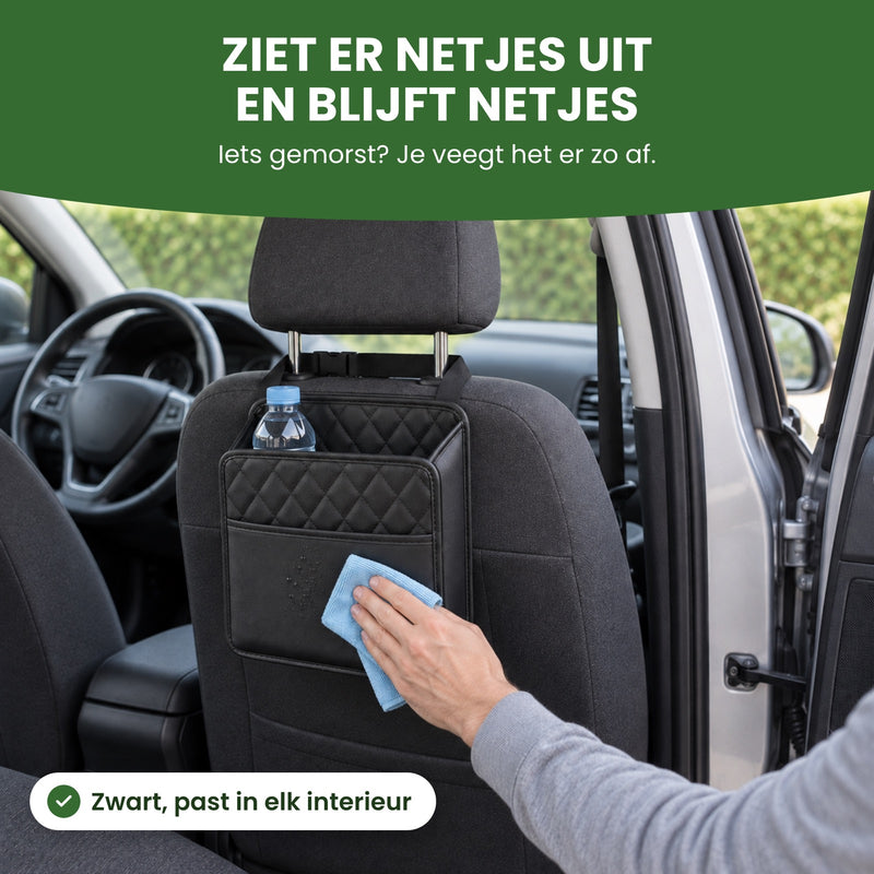 Een hand veegt de Navorra organizer achter de autostoel schoon met een doekje: ziet er netjes uit en blijft netjes