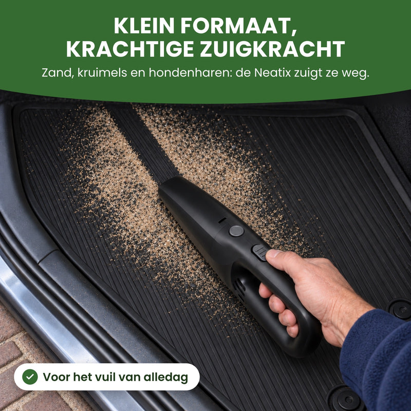 Neatix zuigt zand van een rubberen automat en laat een schone zwarte baan achter: klein formaat, krachtige zuigkracht