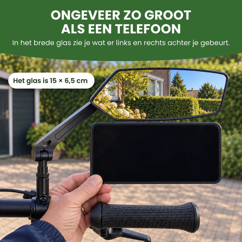 Een hand houdt een telefoon onder de Reflectra fietsspiegel: het glas is 15 bij 6,5 cm, ongeveer zo groot als een telefoon