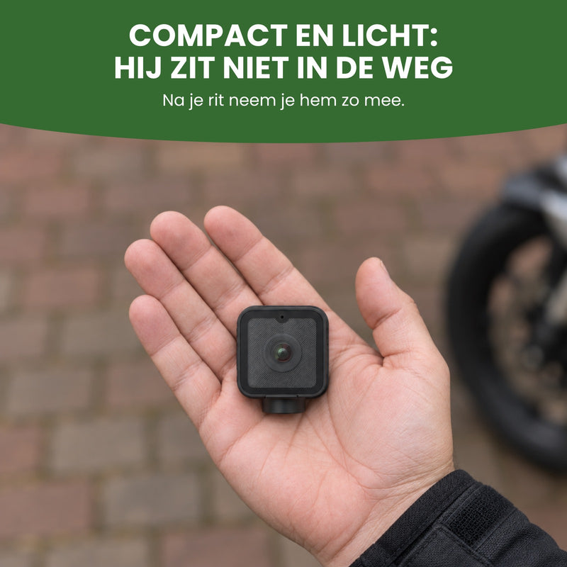 De RideGuard Pro ligt in een open hand: compact en licht, hij zit niet in de weg en je neemt hem zo mee