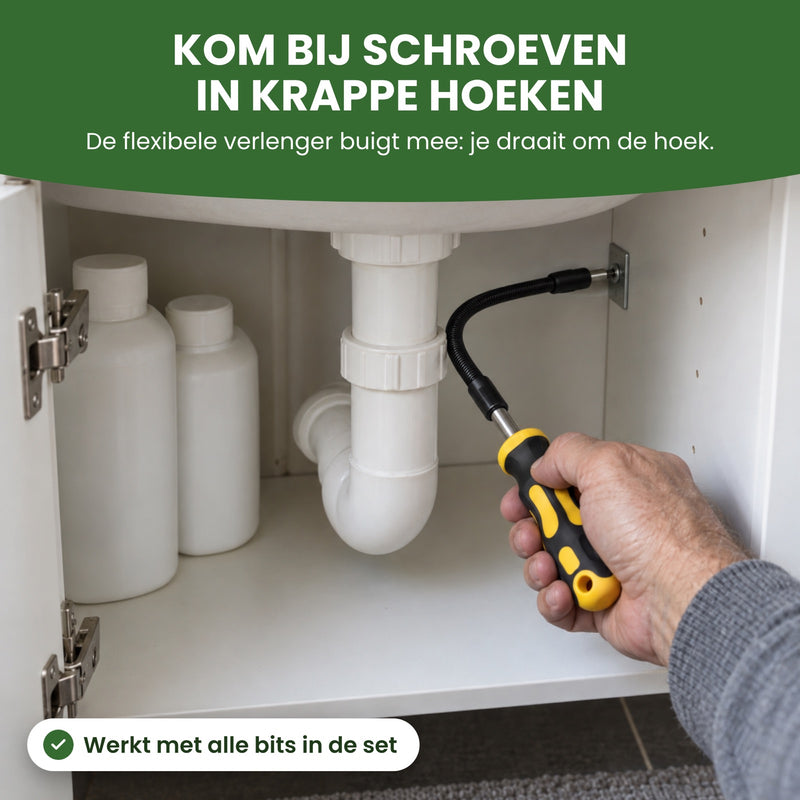 Hand draait met de flexibele verlenger een schroef vast in het kastje onder een wastafel: kom bij schroeven in krappe hoeken