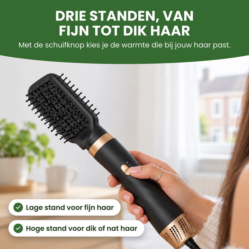 Duim bij de schuifknop van de Stylova met gladborstel: drie standen, laag voor fijn haar en hoog voor dik haar