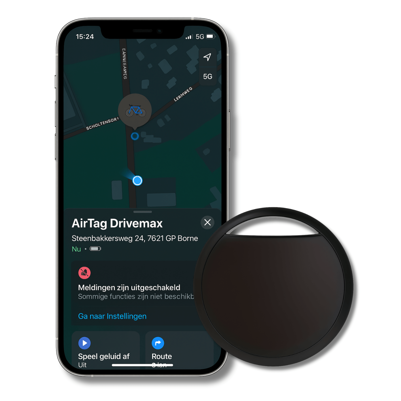 Zwarte TrackGuard gps-tracker naast smartphone met locatie op scherm zichtbaar.