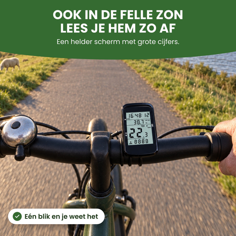 VeloxRide fietscomputer op het stuur op een dijk in de lage zon, gezien vanaf het zadel: een helder scherm met grote cijfers